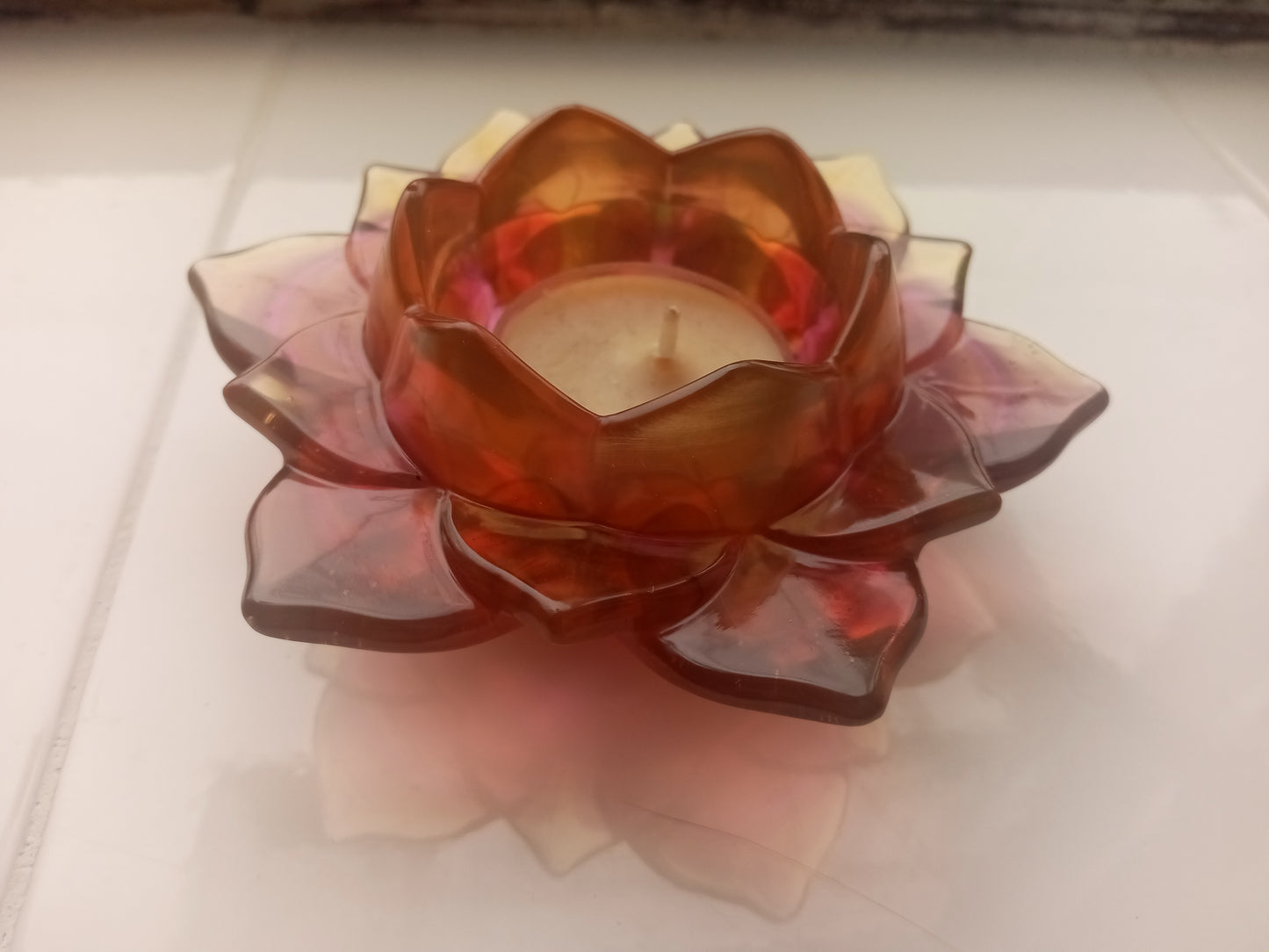 Blossoming flower tealight