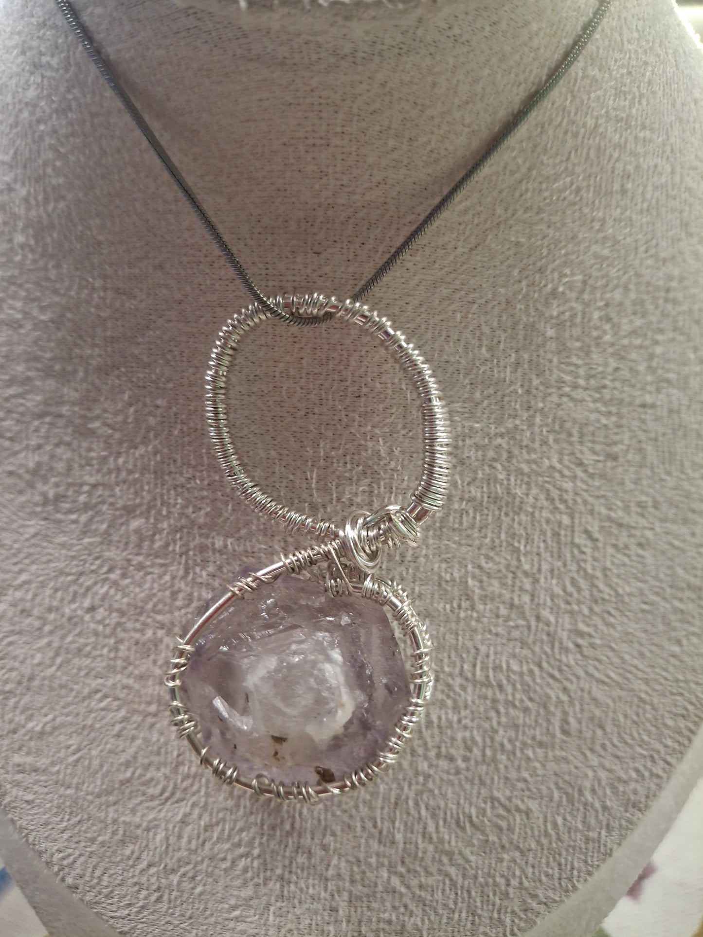 Raw Round Amethyst Pendant – A Story of Stillness and Inner Wisdom